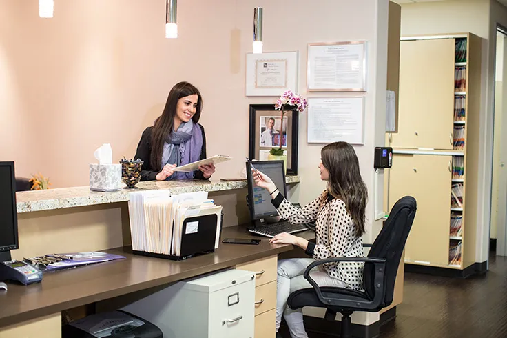 Front desk with patient