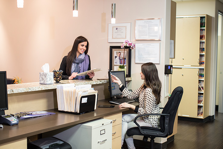 Front desk with patient